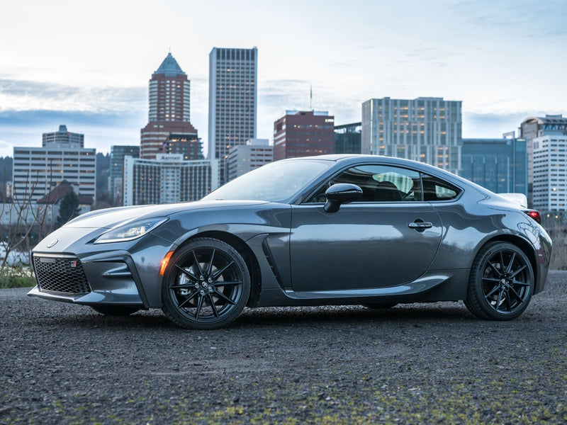 2024 Toyota GR86 ZN8 in gray with city skyline background