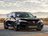 Black Honda Civic Type R car on a road.
