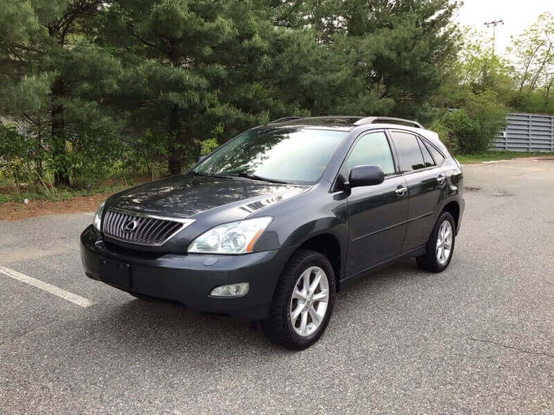 Gray SUV parked on asphalt.